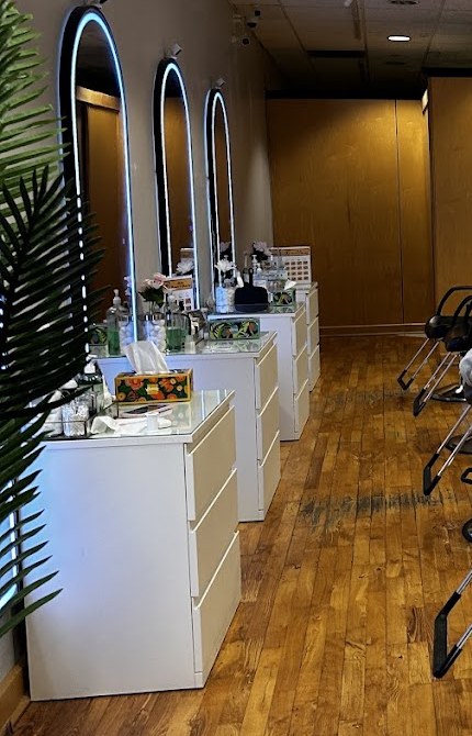 Styling stations with arched mirrors at Belle Brows & Beauty